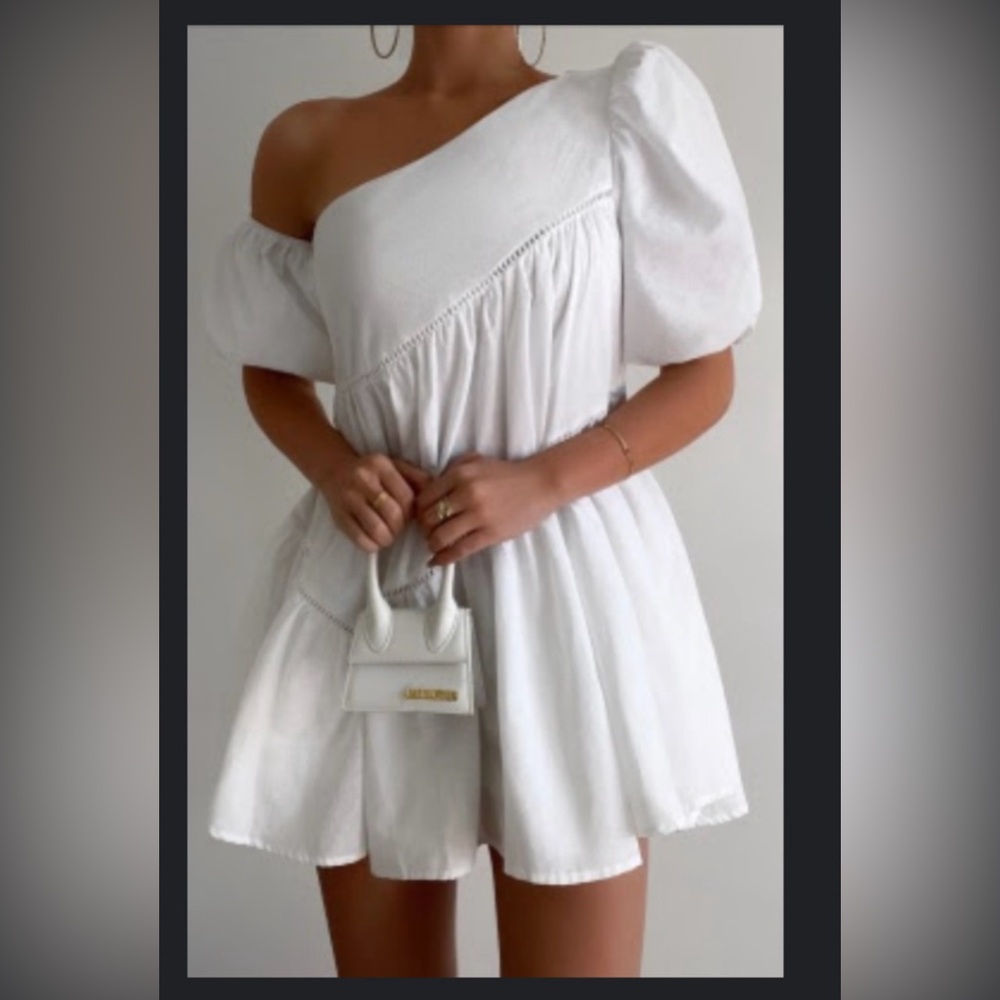 Showpo Harleen Mini Dress — Asymmetric trim puff sleeve